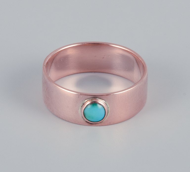 Scandinavian goldsmith. 14 karat gold ring adorned with a turquoise stone. (1 of 5)