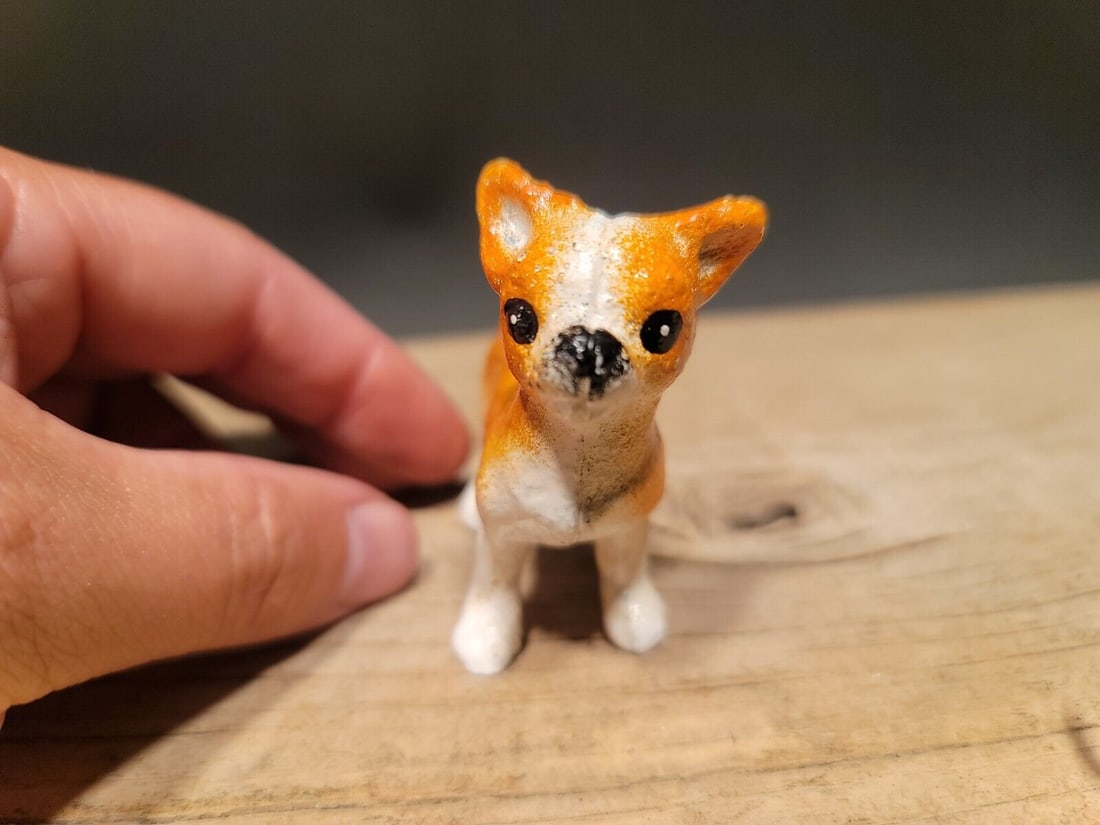 Miniature Cast Iron Chihuahua Figure: 2 3/4" Tall x 1 5/8" Wide Wonderful little reproduction cast iron black and white French bulldog. Good detail cast iron hand painted and slightly aged to look like an antique. Certainly hard to tell i