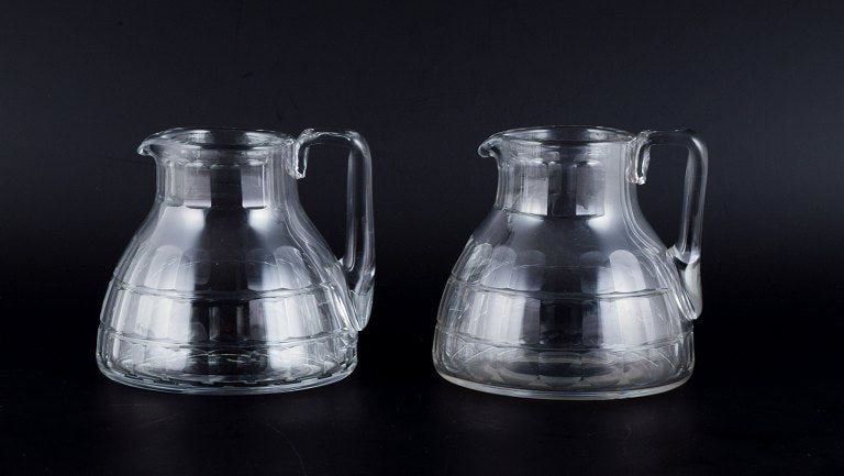 Baccarat, France, two "Charmes" Art Deco pitchers in clear crystal glass. Faceted cut. (1 of 6)