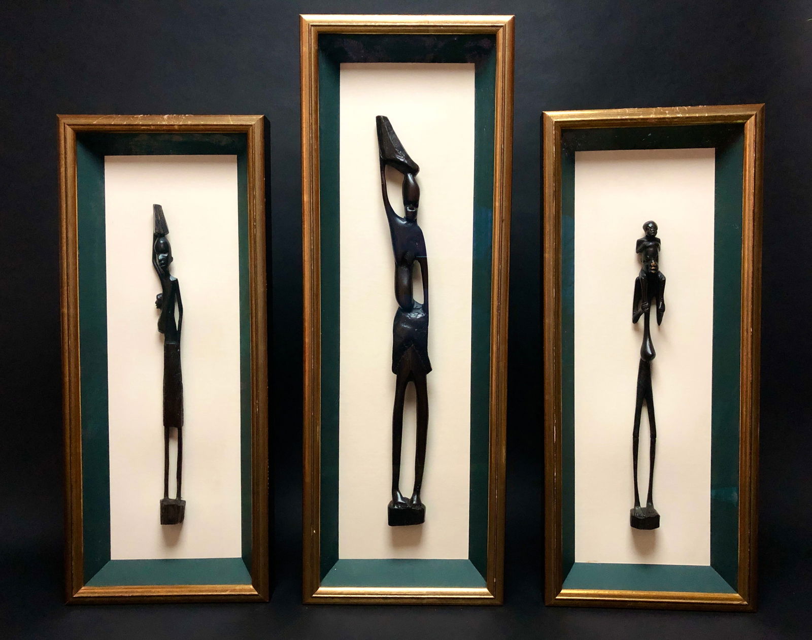 Framed set of 3 wooden African statues. (1 of 20)