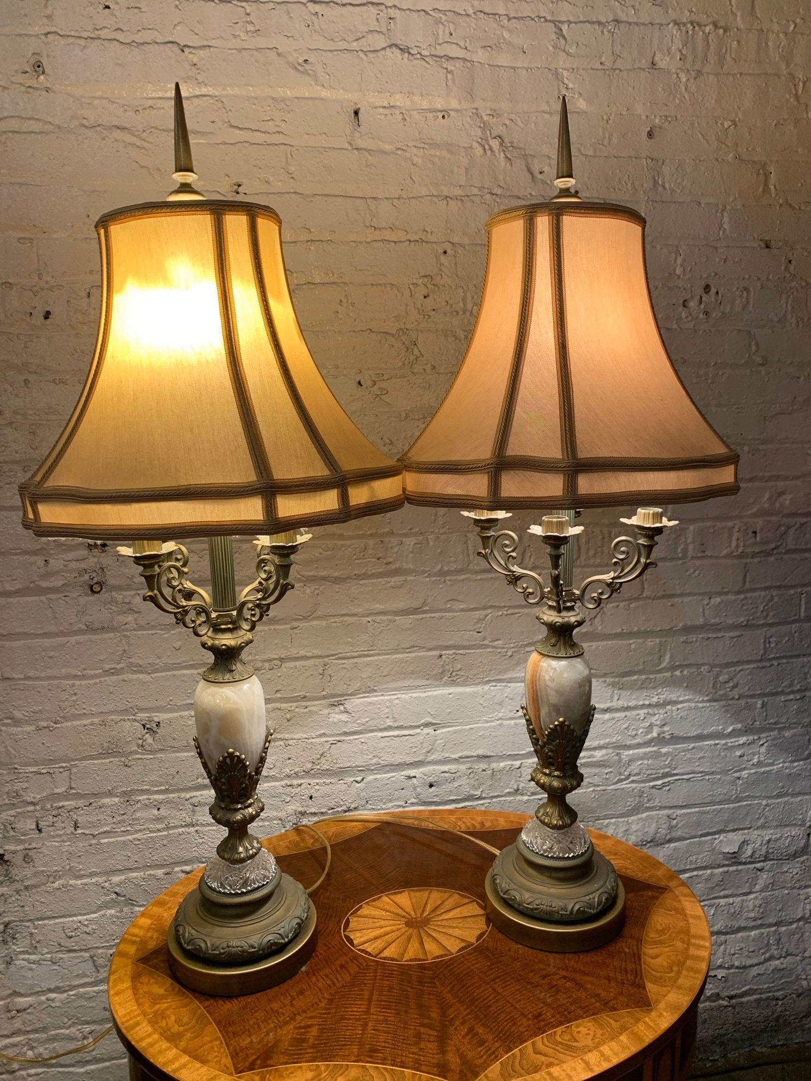 Antique Candelabras Style Onyx and Bronze Table Lamps - Pair: Vintage from the 1930s Materials: Fabric, metal, stone Antique Candelabras Style Onyx and Bronze Table Lamps with Shades - Pair One light lamp with 4 candelabras. Circa 1930 Lamp W 9” D 9”