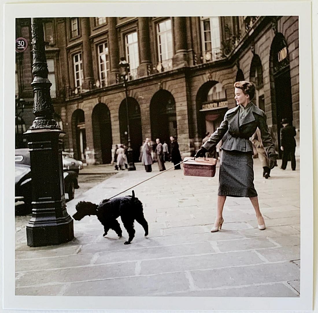 Robert Capa: A Dior model wearing a New Look long skirt. Place Vendome, Paris France 1948: Artist: Robert Capa Title: A Dior model wearing a New Look long skirt. Place Vendome, Paris France 1948 Description: Color photograph 6" x 6", Stamped Estate of Robert Capa Reserve: $220.00 Shipping: