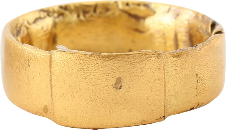 MASSIVE VIKING WARRIOR’S WEDDING RING, 9TH CENTURY AD SIZE 11: 9th century, Cambridgeshire England. Bronze, with a low rounded face and of broad 7.2mm width. Integral raised rectangular bezel. Made with a central core to distribute the molten metal and heat. The