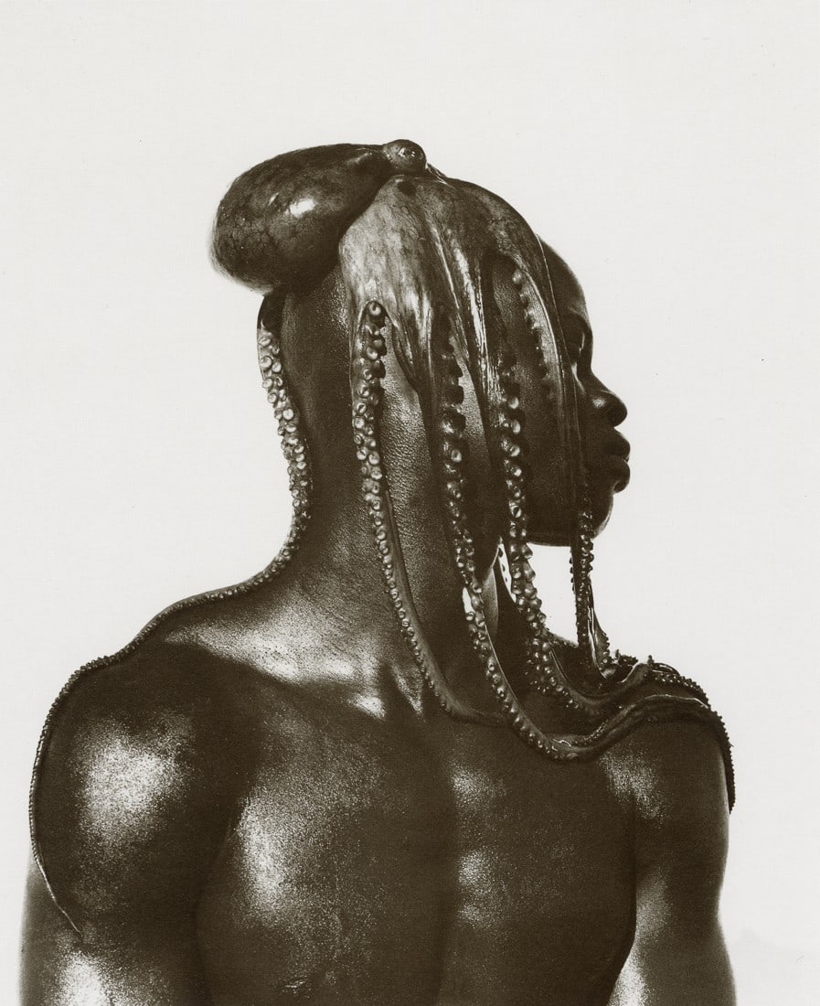 HERB RITTS - Djimon with Octopus, Hollywood, 1989: Artist: Herb Ritts Title: Djimon with Octopus, Hollywood, 1989 Medium: Photo Litho, 1989, Hong Kong Dimensions: 6.6x8.05" Description: Heat Wax Mounted on 8.5x11" Conservation Board Artist Bio: Herb R