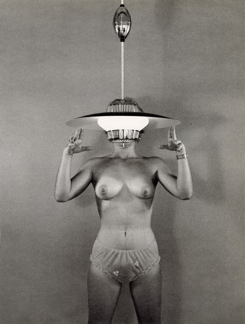 BUNNY YEAGER - Woman With Lamp, 1950s: Artist: Bunny Yeager Title: Woman With Lamp, 1950s Medium: Photo Litho, 1995, Italy Dimensions: 10.2x13.45" Description: Heat Wax Mounted on 14x18" Conservation Board Artist Bio: Linnea Eleanor "Bunny