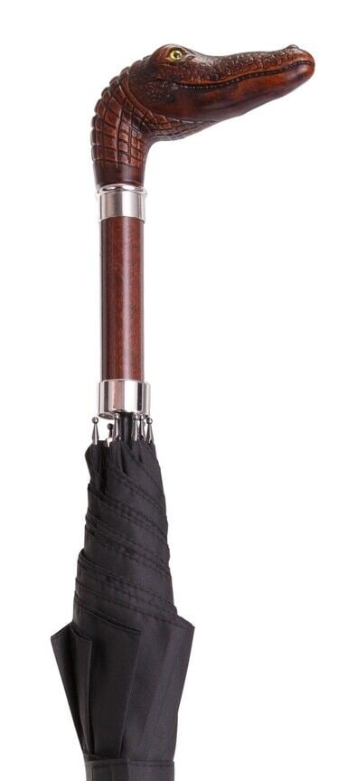 Gator Head Umbrella: This Italian handcrafted umbrella features a sturdy gator head handle and a black canopy on a self-opening 25 x 8 frame, with a sheath for convenient storage. Built to last. Reserve: $90.00 Shipping: 