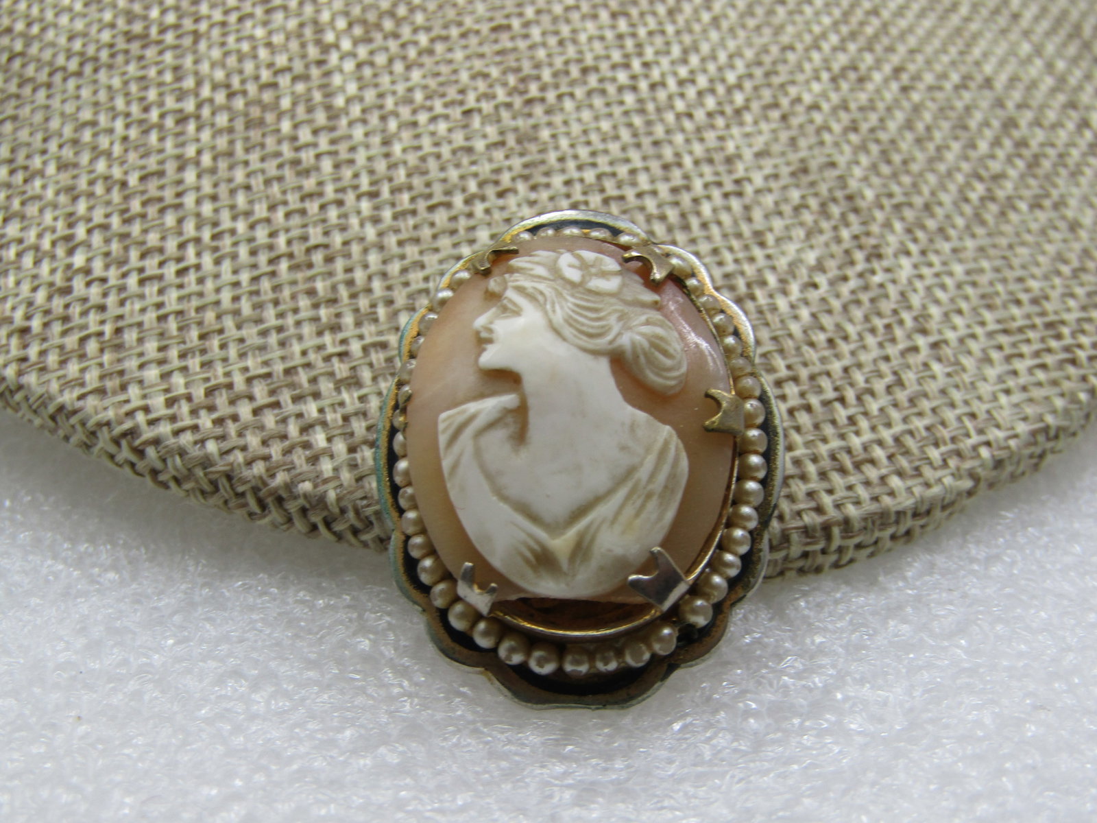 Vintage Cameo & Seed Pearl Brooch, 1930's-1940's.: Vintage Cameo & Seed Pearl Brooch, 1930's-1940's. It is appx. 1.25" tall and 1" wide. the cameo is a woman with flowers in her hair - light passes throug htis nicely when light from ehind. 6 pointed p