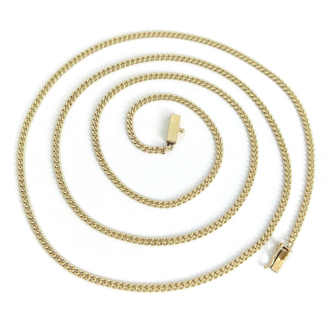 Long Thin Curb Cuban Chain Necklace 14K Yellow Gold, 26 Inches, 2.1 mm, 9.01 Gr: Long Thin Curb Cuban Chain Necklace 14K Yellow Gold, 26 Inches, 2.1 mm, 9.01 Gr This is a classic chain necklace. Please let us know if you have any questions. Metal: 14K yellow gold Weight: 9.01 gram