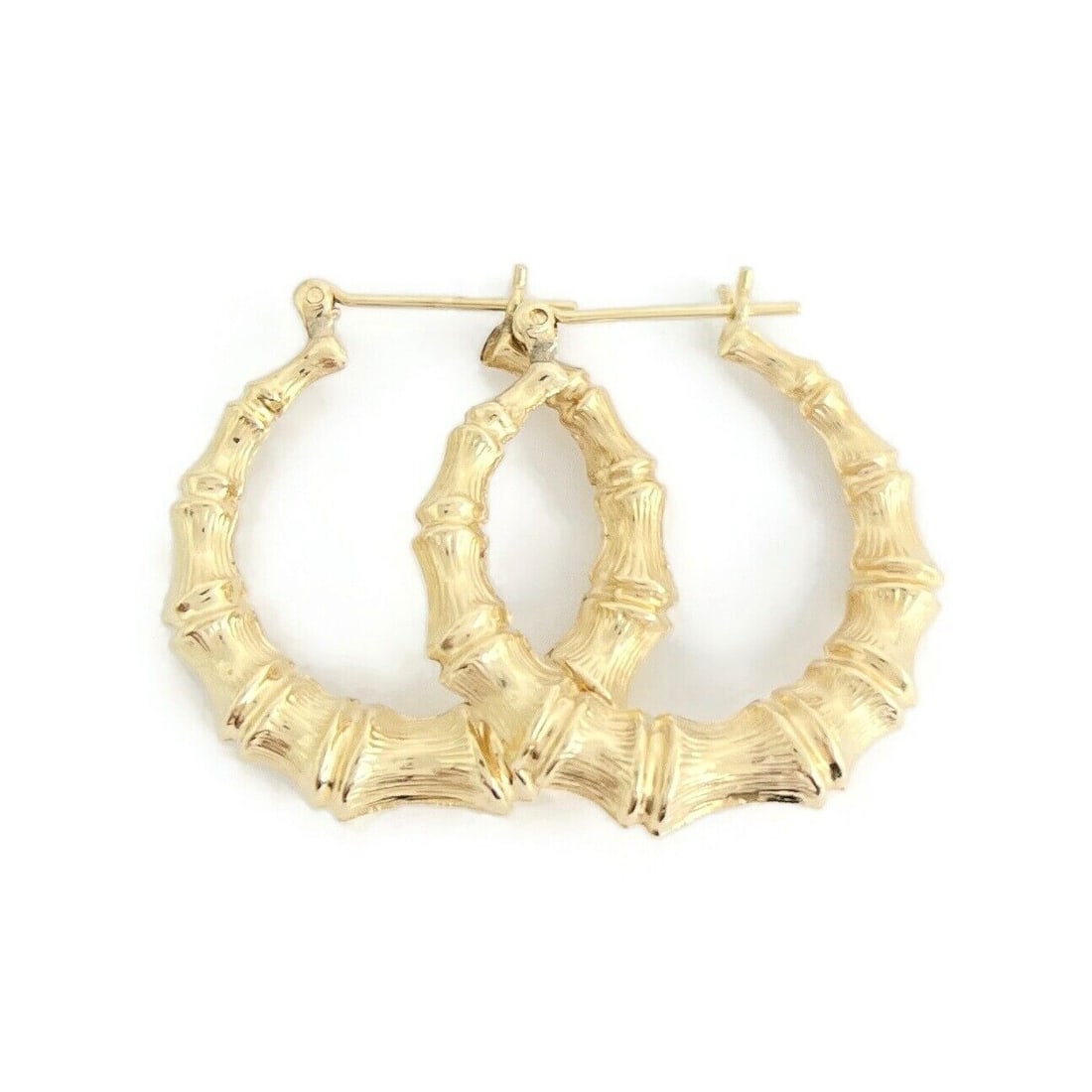 Bamboo Hoop Earrings 14K Yellow Gold, 1.1 Inch, 2.58 Grams: Bamboo Hoop Earrings 14K Yellow Gold, 1.1 Inch, 2.58 Grams These are lovely earrings! Please let us know if you have any questions. Metal: 14K yellow gold Weight: 2.58 grams Stamped: 14K Length: 1.1 i