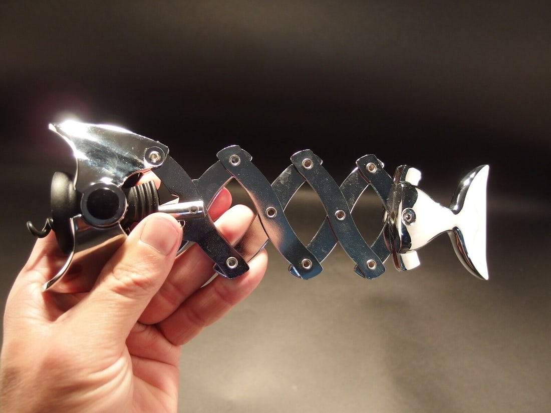 Fish Shaped Wine Bottle Corkscrew Opener: 6 3/4" Long Closed x 3" Wide Such a neat vintage style fish shaped multi lever cork screw. The riveted levers assist in pulling the cork out. Great for use or display! Reserve: $25.00 Shipping: Domest