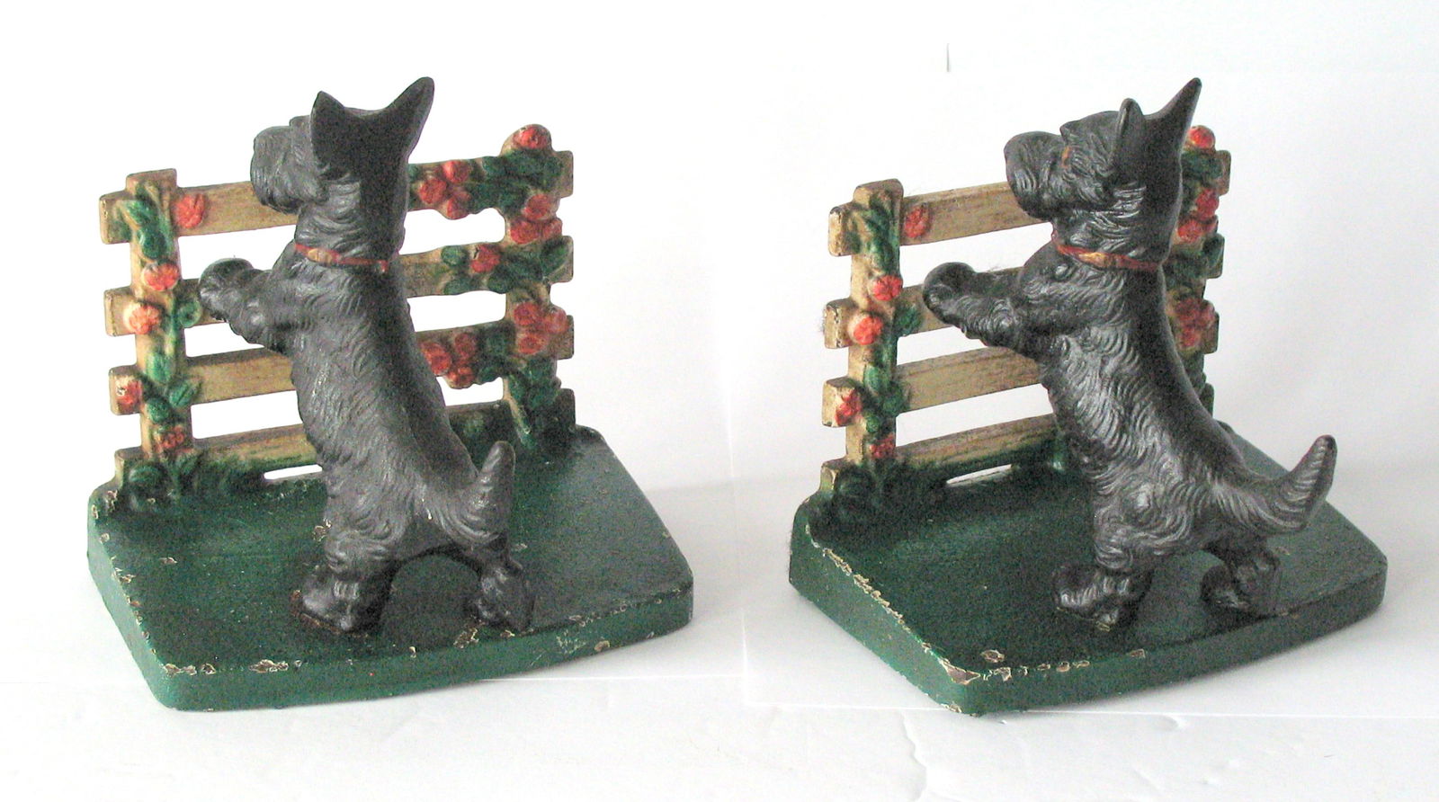 Antique cast iron “Scottie at the fence” bookends. (1 of 3)