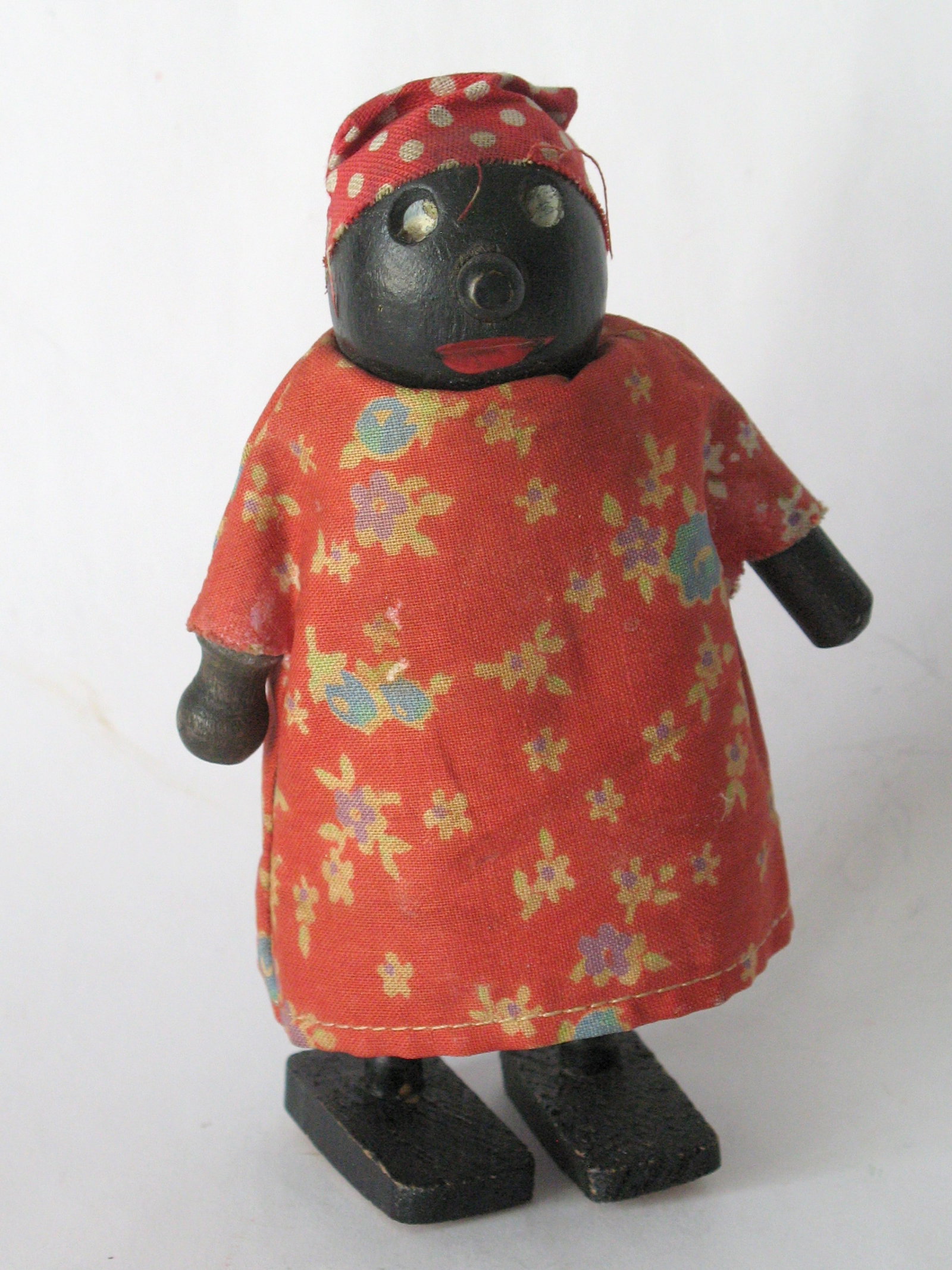 Vintage folk art Mammy walking toy.: Title: Vintage folk art Mammy walking toy. Date/Period: 1950's Dimension: 4 3/4” high Additional Information: Nice vintage Mammy walking toy in great original condition. Shipping: Domestic: Flat