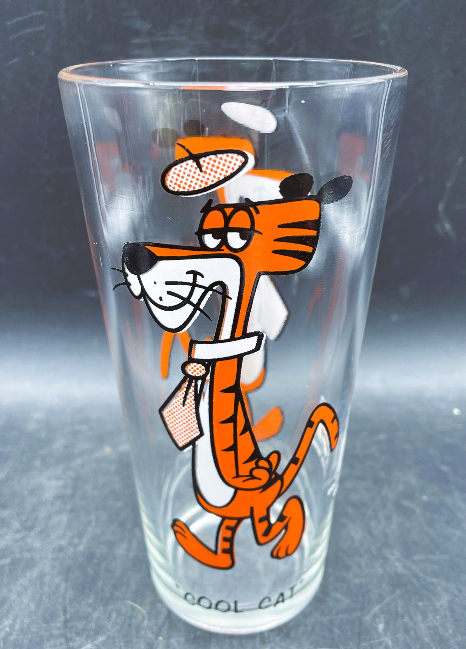 VINTAGE 1973 PEPSI COLLECTOR SERIES COOL CAT CHARACTER GLASS: Title: VINTAGE 1973 PEPSI COLLECTOR SERIES COOL CAT CHARACTER GLASS Date/Period: 1973 Dimension: 6-1/4" TALL Materials: glass Provenance: VINTAGE 1973 PEPSI COLLECTOR SERIES COOL CAT CHARACTER GLASS S