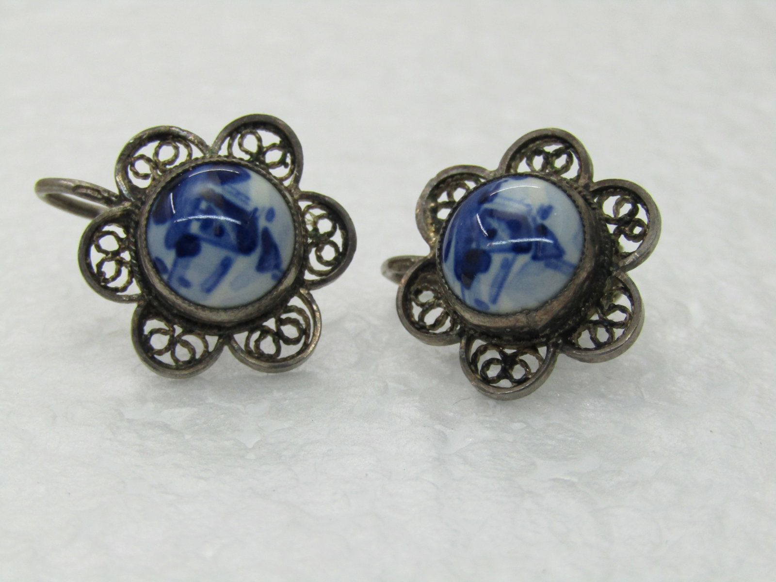 Vintage Delft Windmill Filigree Earrings, Screw Back, Silver: Vintage Delft Windmill Filigree Earrings, Screw Back, Silver - they test as silver and could be German and often they are .800 silver and not .925 sterling. I am not sure if they are sterling but at t