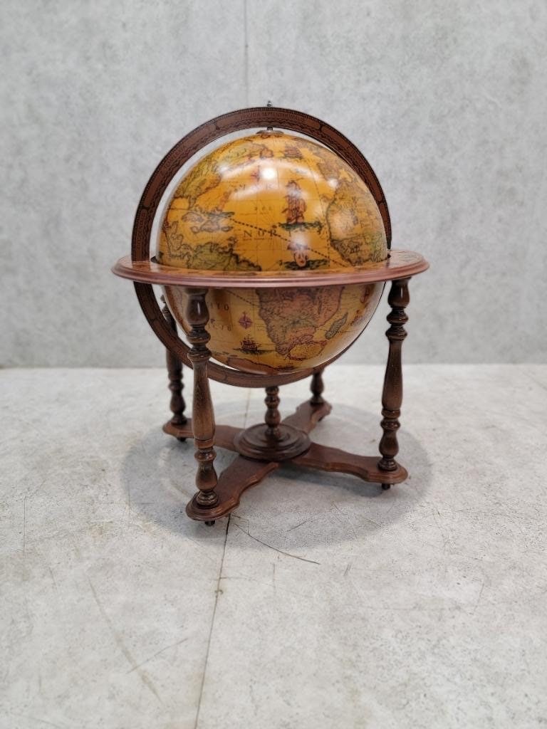 Vintage Mid Century Modern Italian Old World Zodiac Globe Cocktail Bar Cart: Materials: wood Vintage Mid Century Modern Italian Old World Zodiac Globe Cocktail Bar Cart on Turned Wood Leg Globe/Bar on Casters Mid Century modern Italian hand-painted, floor standing globe enclos