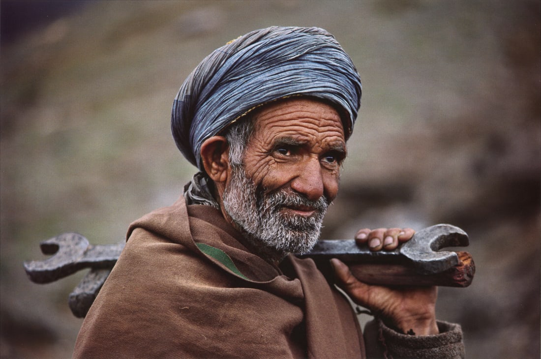 STEVE MCCURRY - Train Engineer, Pakistan, 1983: Artist: Steve McCurry Title: Train Engineer, Landi Kotal, Pakistan, 1983 Medium: Photo Litho, 2012, Italy Dimensions: 14x9.3" Description: Heat Wax Mounted on 14x18" Conservation Board Artist Bio: Ste
