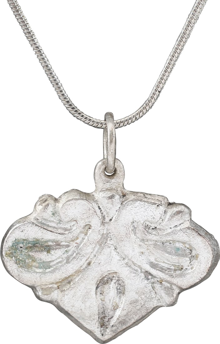 VIKING/SCANDINAVIAN HEART PENDANT C. 1100-1300 AD: 11th-13th century, the period of conversion to Christianity. Old traditions, beliefs, and superstitions were blended with Christianity during the conversion of Vikings to Christianity. This heart pend