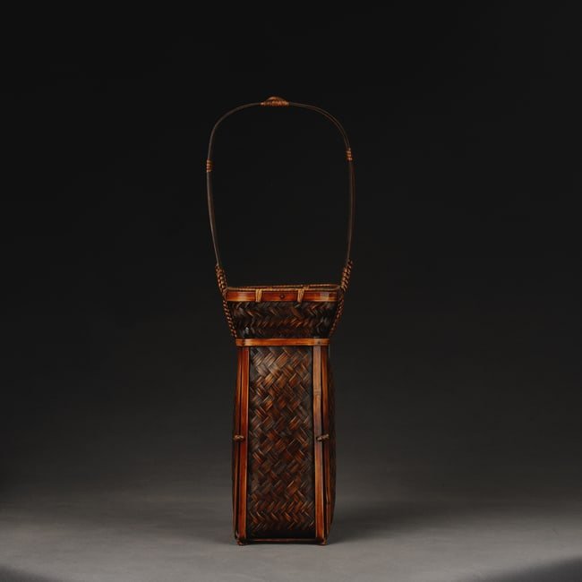 Japanese Showa Period Bamboo Flower Vessels: DescriptionTitle: Japanese Showa Period Bamboo Flower VesselsOrigin: Asian private collectionDate/Period: 20thDimensions: Size: about 44x15x11 cm, a Japanese Showa period bamboo flower basket, hand-ca