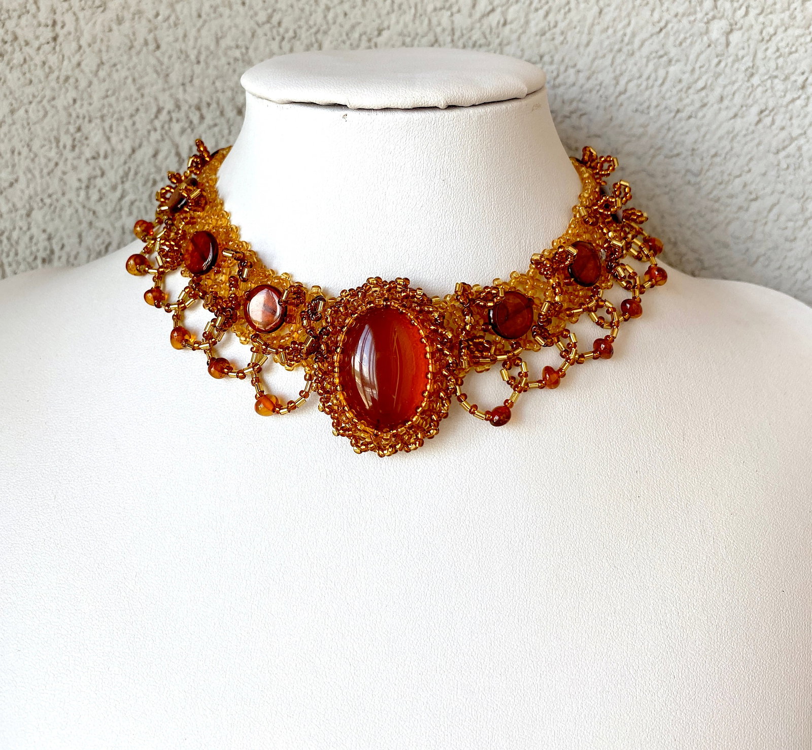 Beautiful Amber Cleopatra necklace: Title: Beautiful Amber Cleopatra necklace Metal: None Gemstone:Amber Weight : 35.95 g Size: Size: 340.0 x 40.0 x 10.0 mm Size: 13.386 x 1.575 x 0.394 inches Made of: (Reconstituted Amber or Whole Ston