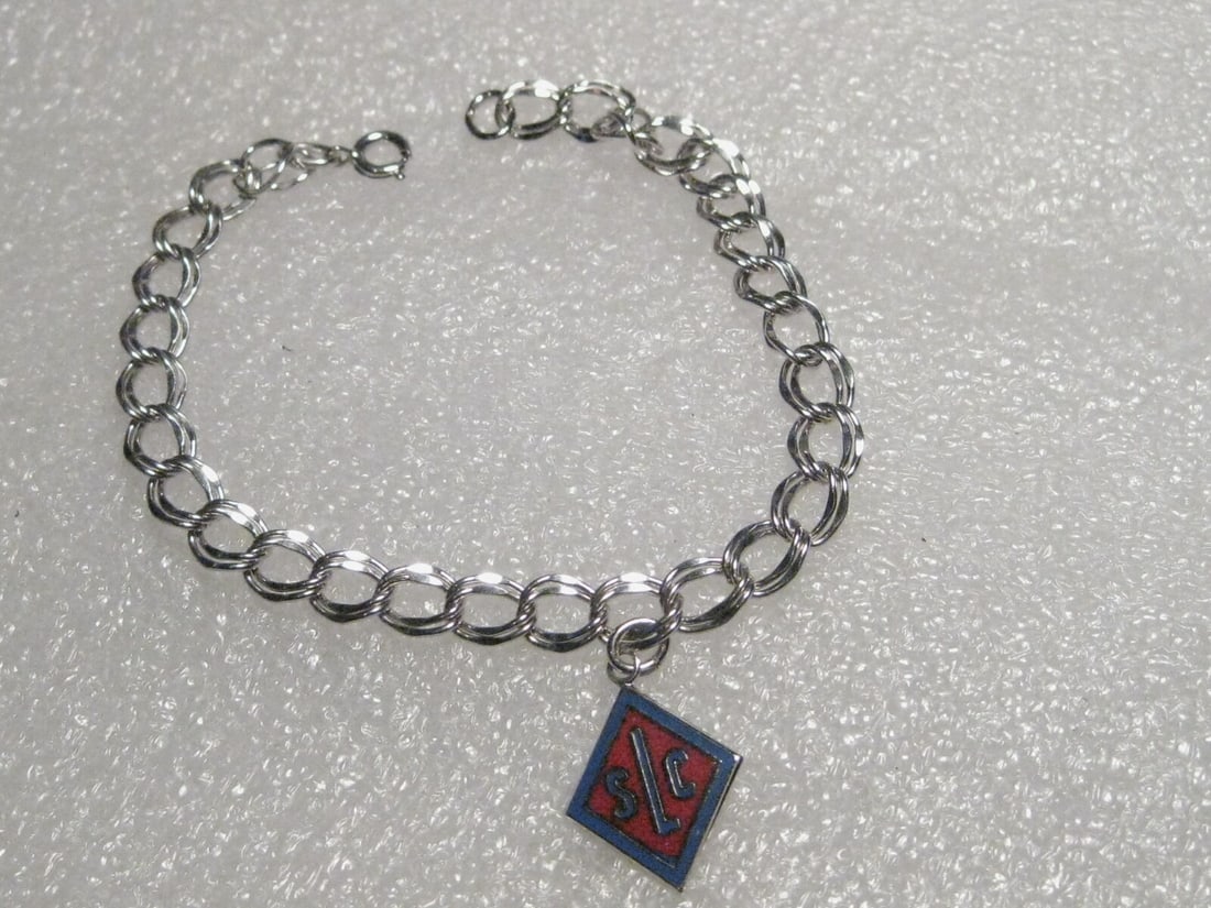 Vintage Sterling Silver Charm Bracelet with Red/Blue Enamel Charm SLC - 7.5": Vintage Sterling Silver 7.5" charm bracelet with double link bracelet and a single diamond shaped charm that is red and blue enamel with the initials SLC. Weight is 6.45 grams. The charm is signed Kin