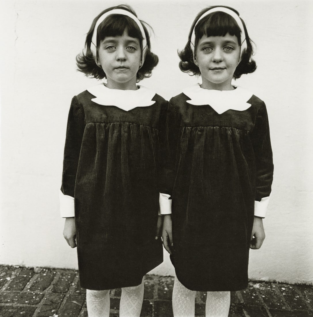 DIANE ARBUS - Identical Twins, Roselle, NJ, 1967: Artist: Diane Arbus Title: Identical Twins, Roselle, NJ, 1967 Medium: Photo Litho, 1972, USA Dimensions: 8.3x8.4" Description: Heat Wax Mounted on 11x14" Conservation Board Artist Bio: Diane Arbus was