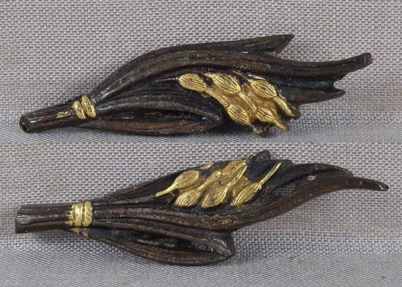 Pair 19c Japanese sword MENUKI RICE with STALKS: Pair of 19th century Japanese sword menuki depicting rice plants with stalks. Pleasant design, bronze with light brown patina, gilding, in great condition. Length 1 11/16 inches. Reserve: $150.00 Ship