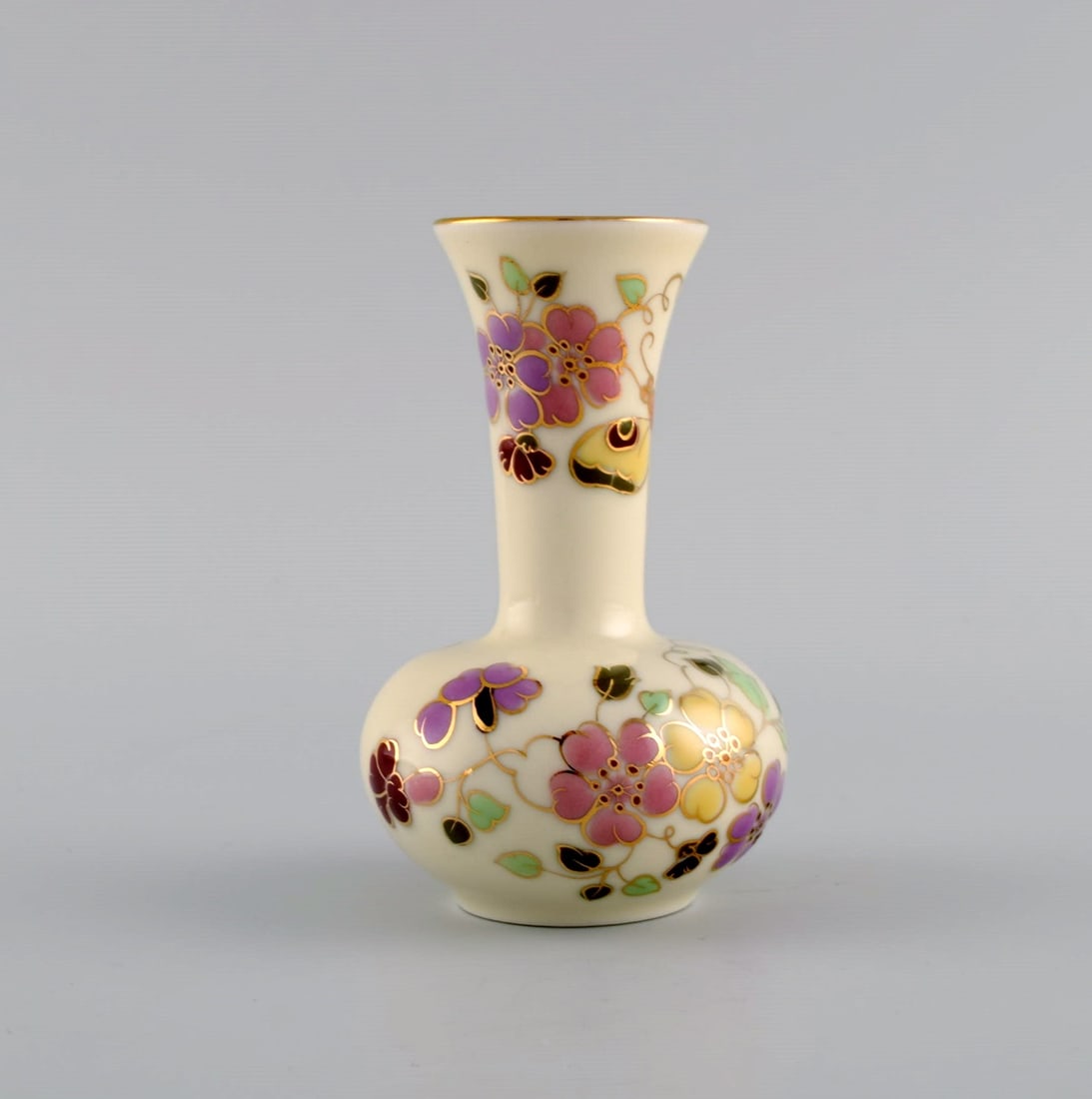 Zsolnay vase in cream-colored porcelain with hand-painted flowers, butterflies and gold decoration. (1 of 5)