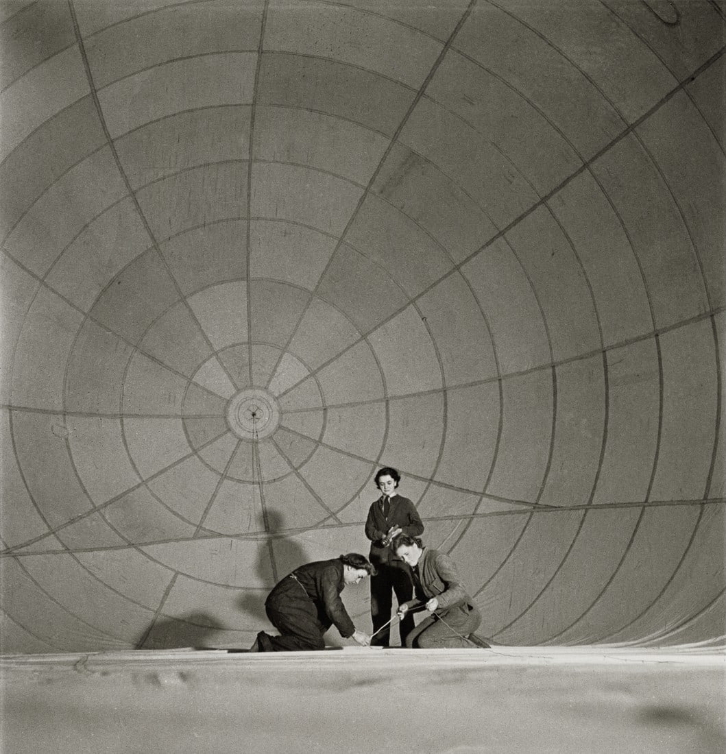 CECIL BEATON - The Women's Auxiliary Air Force, 1941: Artist: Cecil Beaton Title: Members Of The Women's Auxiliary Air Force Repair A Barrage Balloon, 1941 Medium: Photo Litho, 2015, China Dimensions: 10.2x10.6" Description: Heat Wax Mounted on 12x16" Co