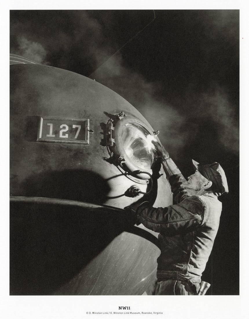 O. WINSTON LINK - J.W. Dalhouse Cleans A Headlight: Artist: O. Winston Link Title: J.W. Dalhouse Cleans A Locomotive Headlight - Close View, Shaffers Crossing Roundhouse, Roanoke, Virginia, 1955 Medium: Photo Litho, 2019, Germany Dimensions: 7.75x9.55"