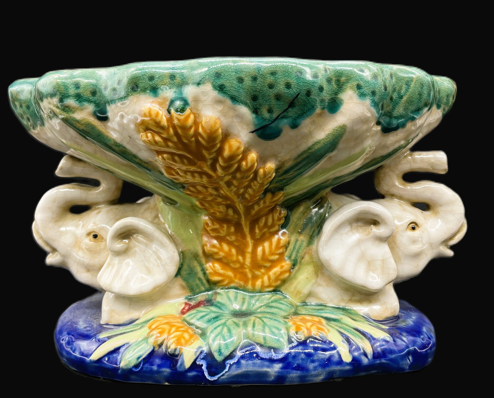 ITALIAN MAJOLICA BOWL WITH ELEPHANTS: Title: ITALIAN MAJOLICA BOWL WITH ELEPHANTS Date/Period: unknown Dimension: Approx. 10.5 x 6 x 6 Material: ceramic Additional Information: ITALIAN MAJOLICA BOWL WITH ELEPHANTS Shipping: Domestic: Flat