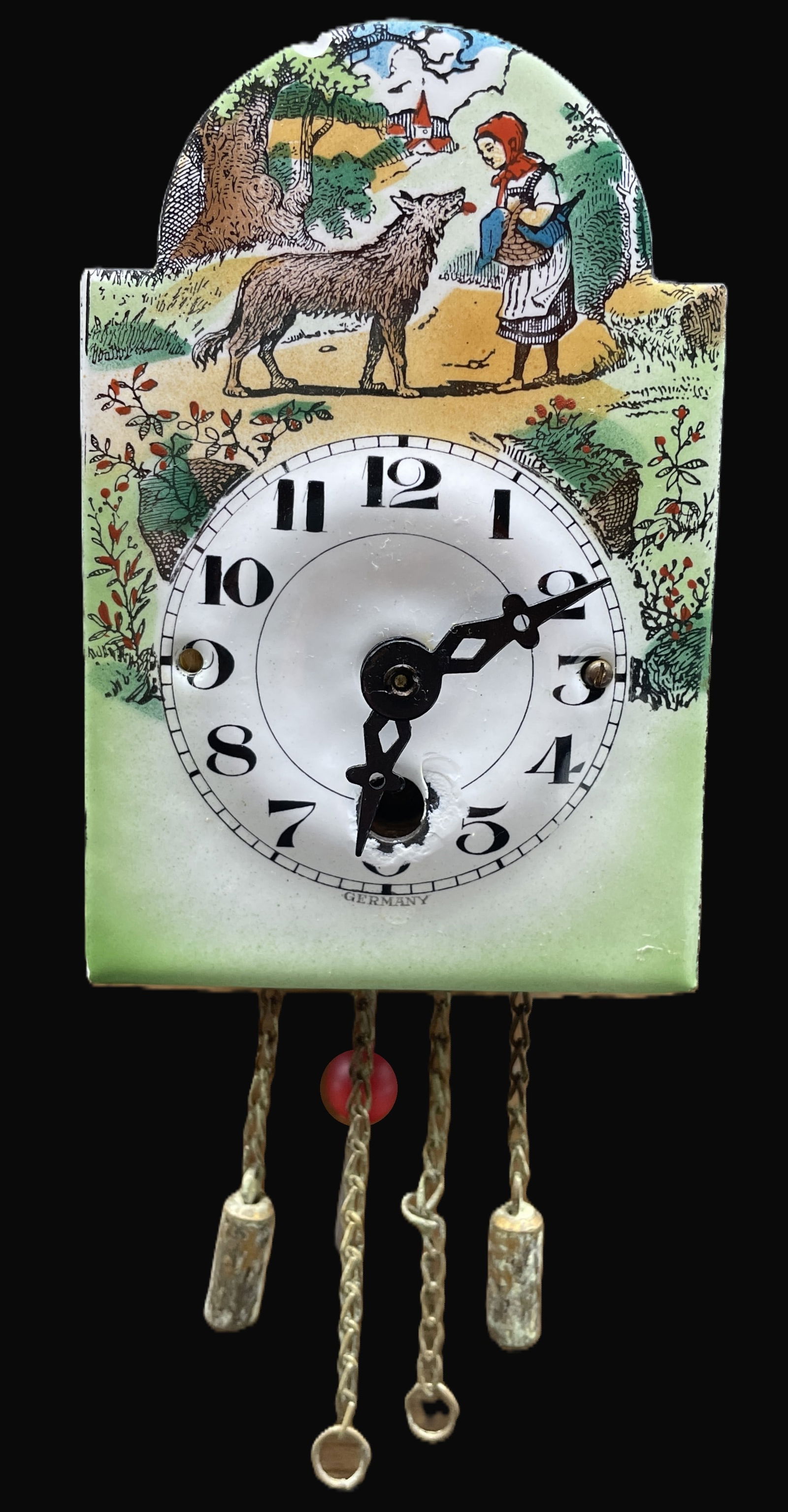 VINTAGE LITTLE RED RIDING HOOD JUBA CLOCK FACE MADE IN GERMANY: Title: VINTAGE LITTLE RED RIDING HOOD JUBA CLOCK FACE MADE IN GERMANY Date/Period: unknown Dimension: Approx 4 x 2.5 x 1.5 Material: mixed materials Additional Information: It has enamel face with Lit
