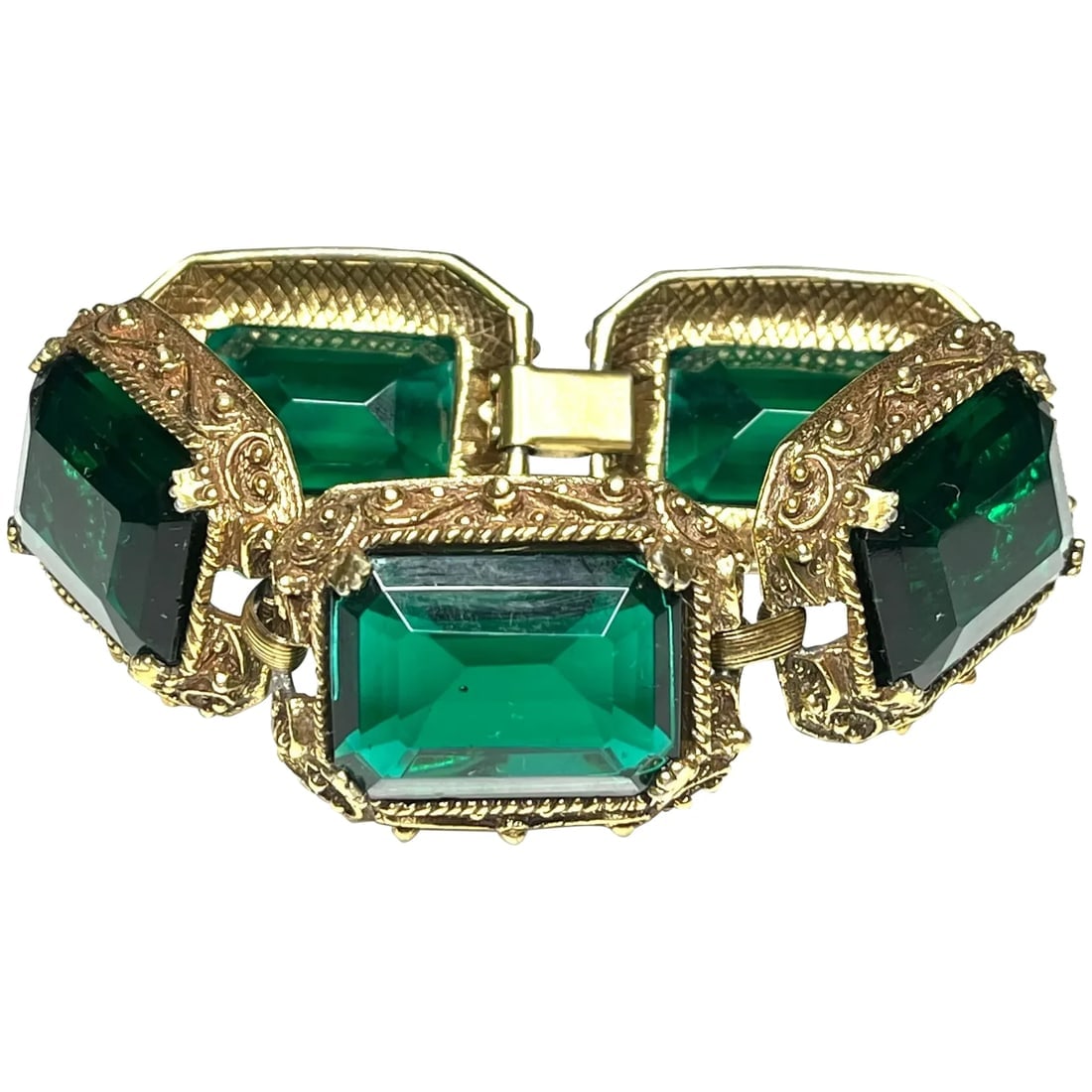 Vintage Emerald Cut Statement Bracelet: Title: Vintage Emerald Cut Statement Bracelet Description: Vintage Emerald Cut Statement BraceletNo hallmarks but this a quality piece of costume jewelry, mostly likely designer (unbranded)Length 7.25