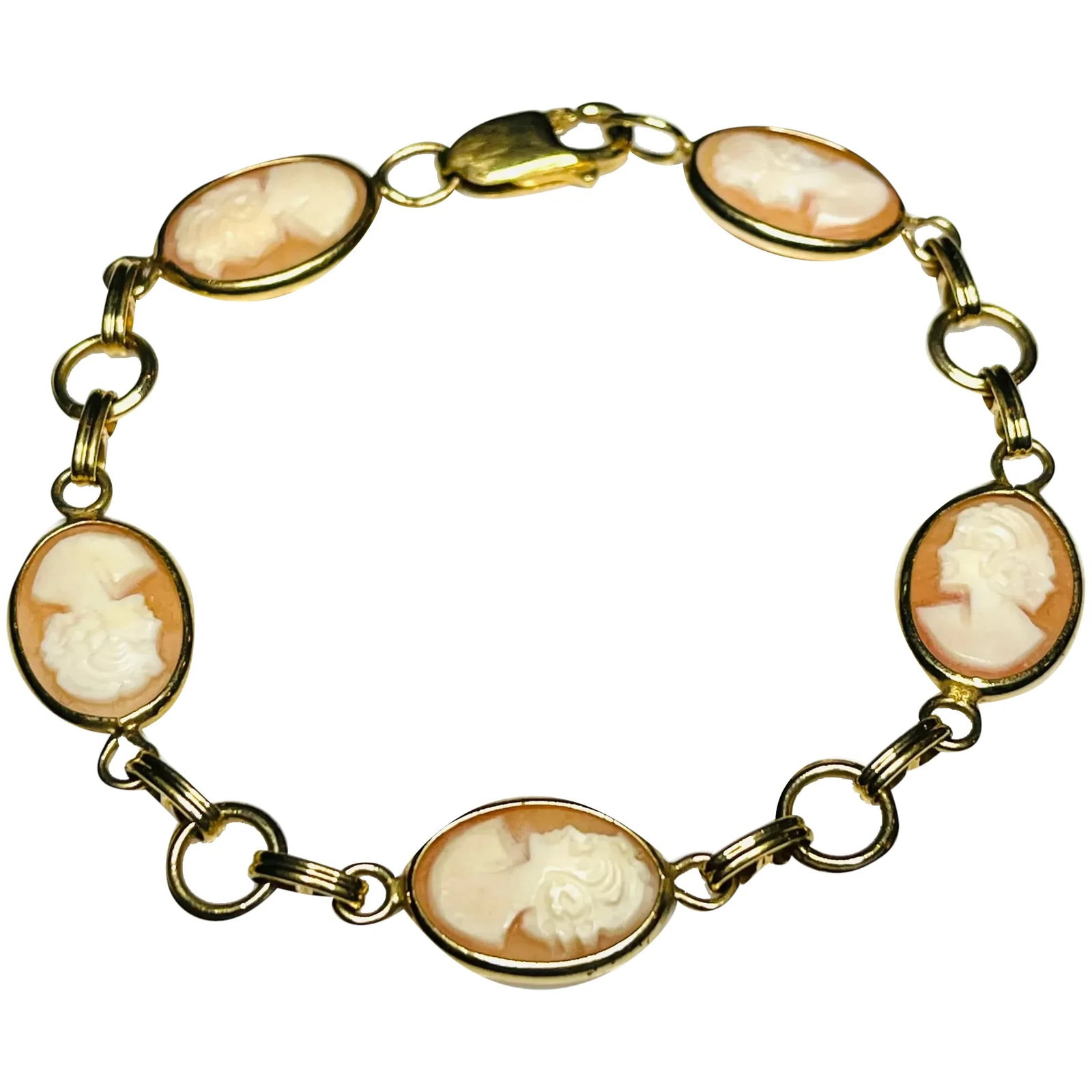 Van Dell Gold Filled Carnelian Shell Cameo Bracelet: Title: Van Dell Gold Filled Carnelian Shell Cameo Bracelet Description: Van Dell Gold Filled Carnelian Shell Cameo Bracelet7.5 inches lengthHallmarked Van Dell Date/Period:VIINTAGE Materials:Gold Fill