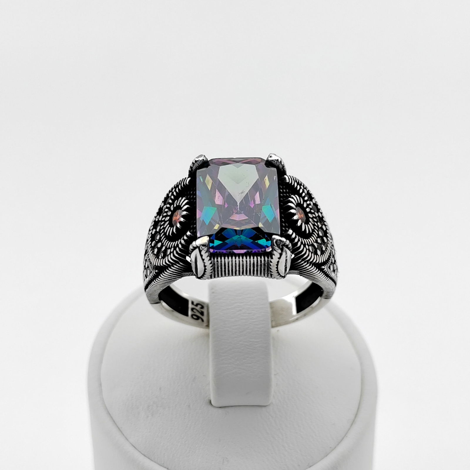 925 Silver Men's Ring with Mystic Topaz: Title: 925 Silver Men's Ring with Mystic Topaz Description: 925 Silver Men's Ring with Mystic Topaz Lab Created,Ornated with Red and Black Zircons -Weight:10.6g -Size: US Size 11.75 (21.25mm) With Gif
