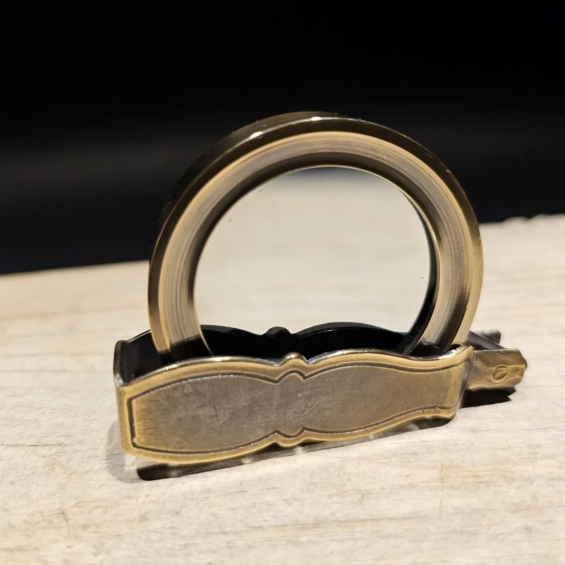 Brass Pocket Folding Optical Glass Magnifying Lens Loupe: 5 1/4" at its longest 2" wide Nice reproduction of an antique brass flip out Magnification glass or lens. Magnifying glasses like this were used in the 18th and 19th century due to the poor lighting a