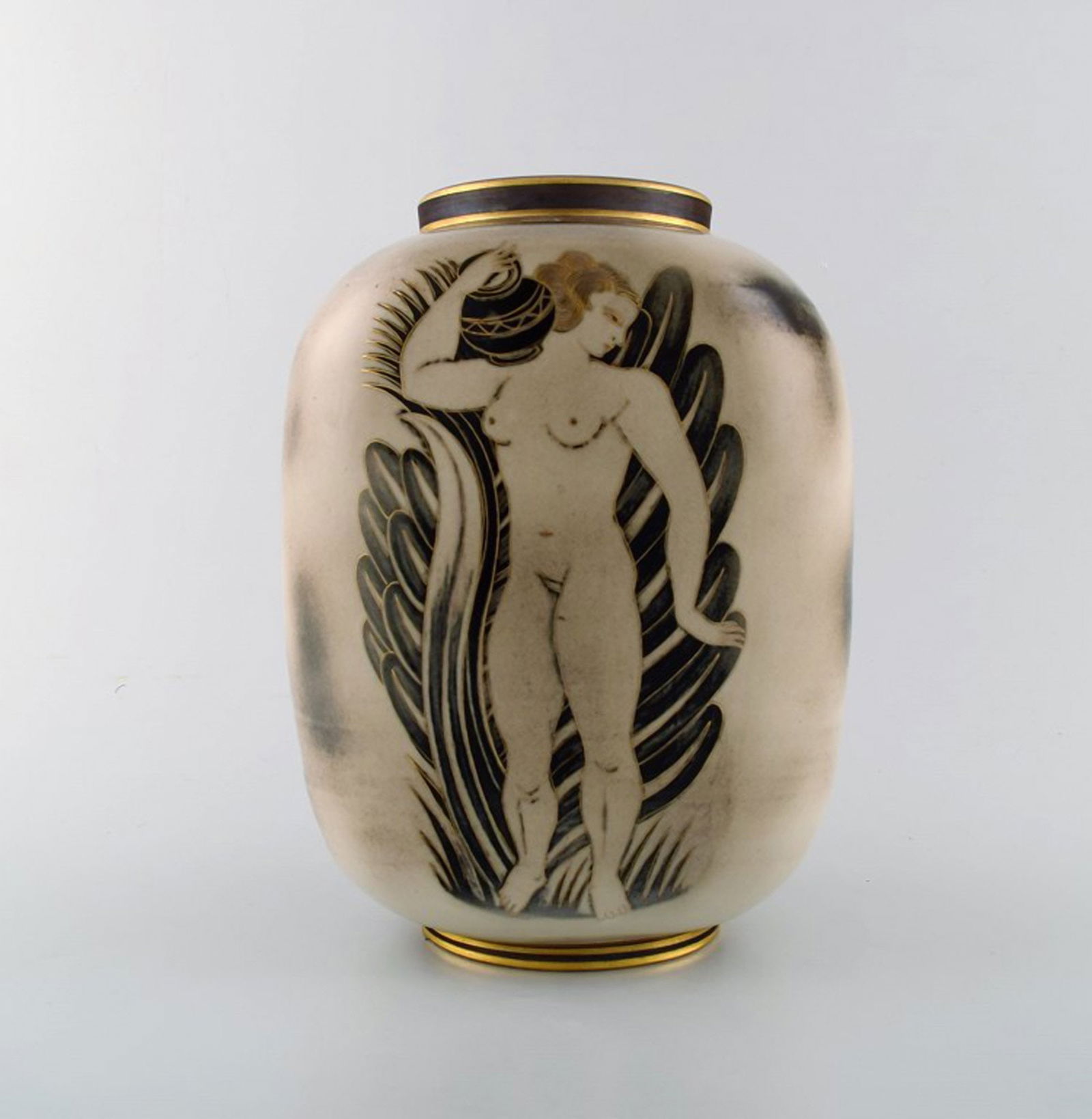 Gunnar Nylund for ALP Lidköping. Unique hand crafted Art Deco Flambé vase in ceramic with: Gunnar Nylund for ALP Lidköping. Unique hand crafted Art Deco Flambé vase in ceramic with nude woman carrying jar. 1930's. Model number 807. Decoration by Oskar Dahl. In very good condition.