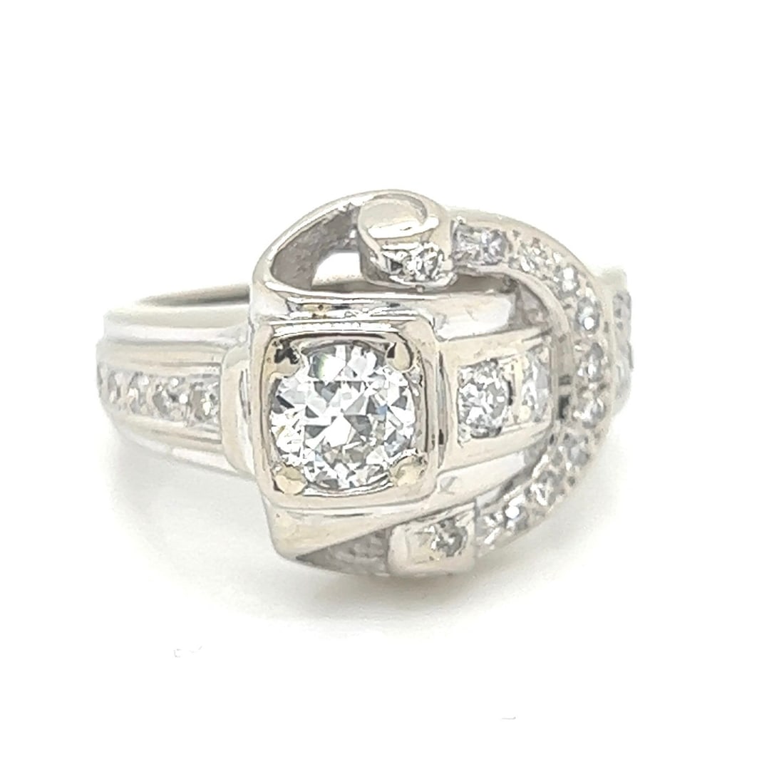 14k Antique diamond buckle ring: Vintage from the 1940s Size: 6 US Materials: White gold Gemstone: Diamond Adjustable Style: Art deco Antique Art deco solid 14kt white gold diamond buckle ring with .75 tcw H color vs 2 diamonds. Cent