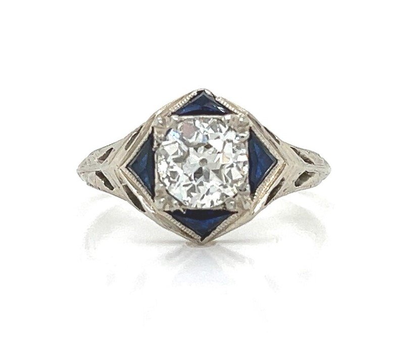 Antique Diamond Engagement Ring .90 ct GIA cert: Vintage from the 1920s. Size: 6 US. Materials: Gold. Gemstone: Diamond. Adjustable. Style: Art Deco. Antique diamond engagement ring with .90ct GIA certified J vs2 flanked by 4 triangular sapphires se