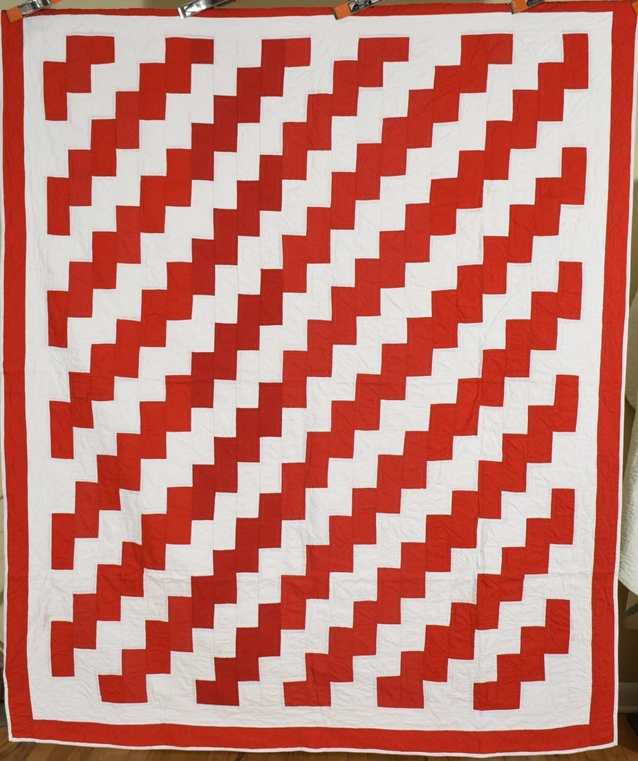 Vibrant 20's Red & White Zigzag Quilt: Title: Vibrant 20's Red & White Zigzag Quilt Date: 1920's Origin: Ohio Material: Cotton Dimension [INCHES]: 68" X 82" Provenance: Cotton 1910's / 1920's red and white streak of lightning / zigzag quil