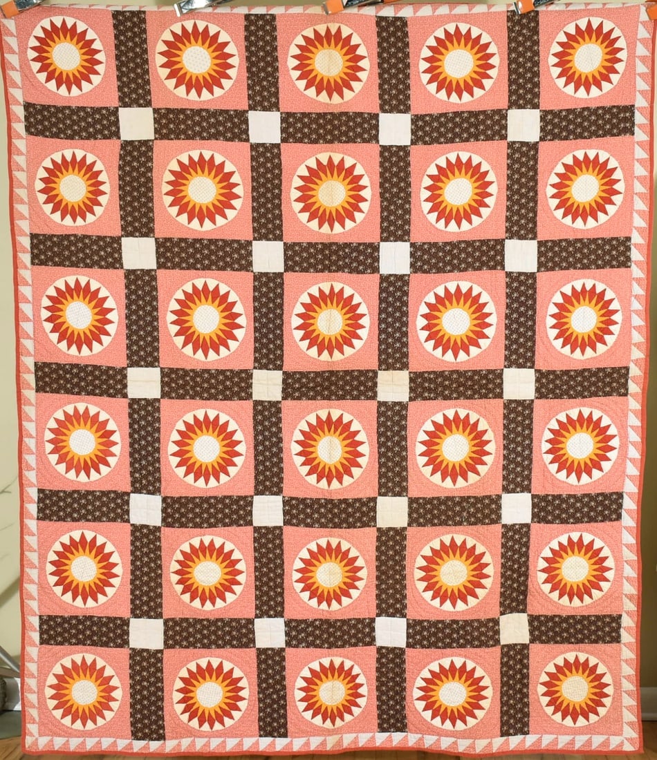 Vibrant 1880's Sunburst Quilt: Title: Vibrant 1880's Sunburst Quilt Date: 1870's / 1880's Origin: Washington Material: Cotton Dimension [INCHES]: 66" X 76" Provenance: Cotton 1870's / 1880's sunburst / compass quilt, all hand piece