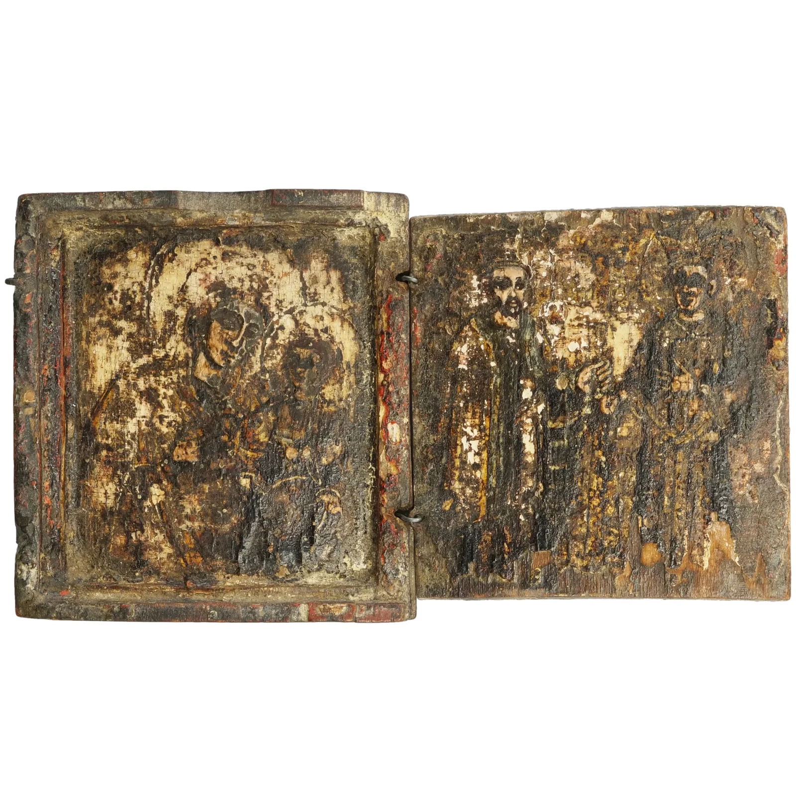 Antique Russian Orthodox Folding Travel Icon: Title: Antique Russian Orthodox Folding Travel Icon Size: 2 3/8” (5.9 cm) tall x 2 3/8” (5.9 cm) wide x 3/8” (.8 cm) thick when closed. Description:A very old wooden folding Icon wit