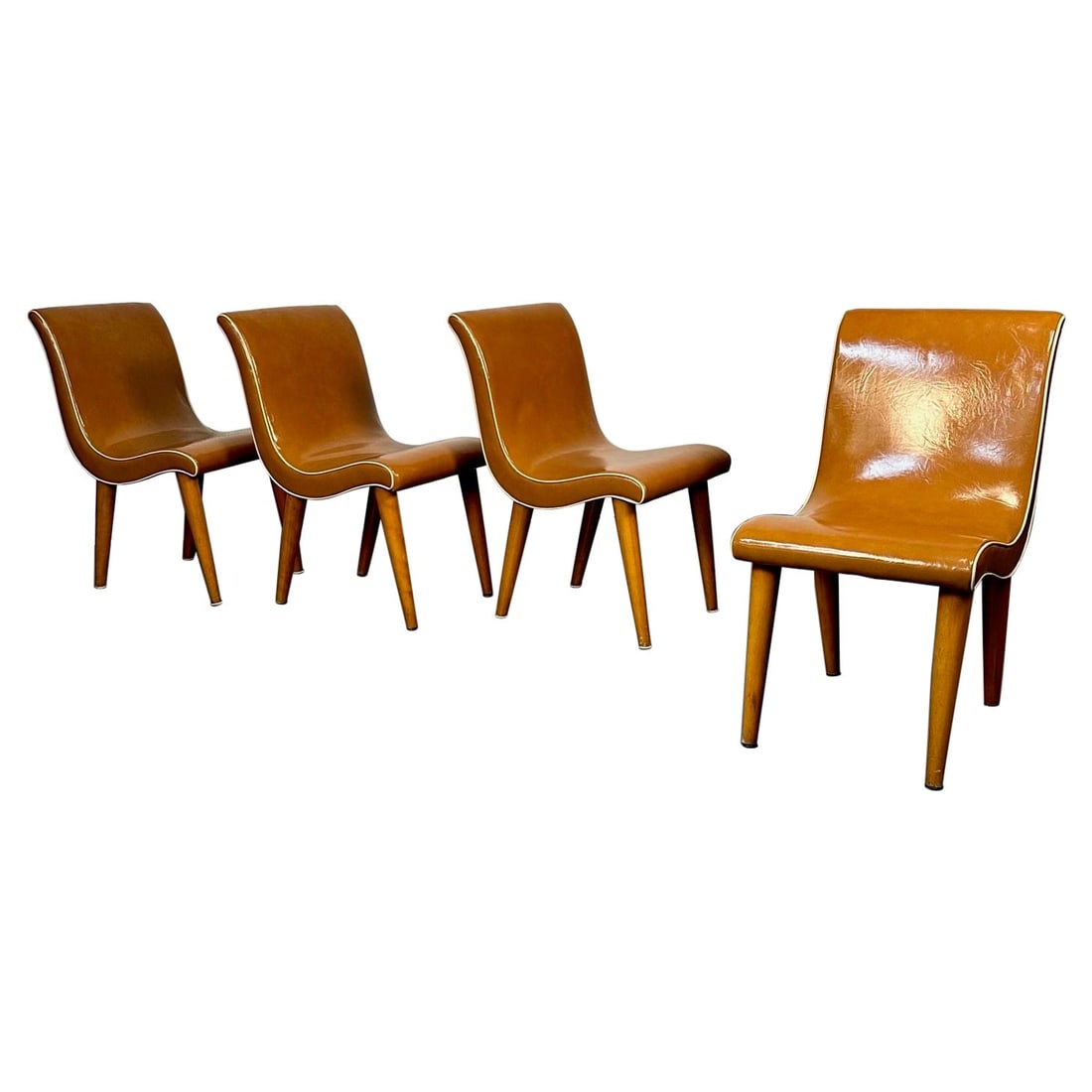 Four American Mid-Century Modern Curvy Dining / Side Chairs by Russel Wright: About the Item Four American Mid-Century Modern Curvy Dining / Side Chairs by Russel Wright Russel Wright for Conant-Ball set of 4 curvaceous dining or side chairs. Each chair having four slightly cur
