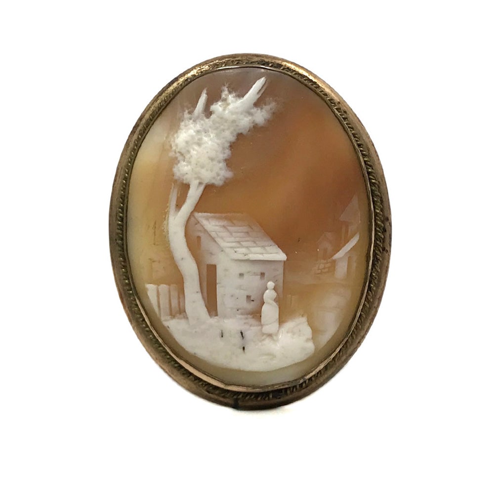 Antique Cameo with Country Cottage Scene: This is an antique cameo brooch or pendant. Carved shell with rare country cottage scene with a woman's silhouette (possibly a depiction of Rebecca at the well). It was made in the late1800s through e