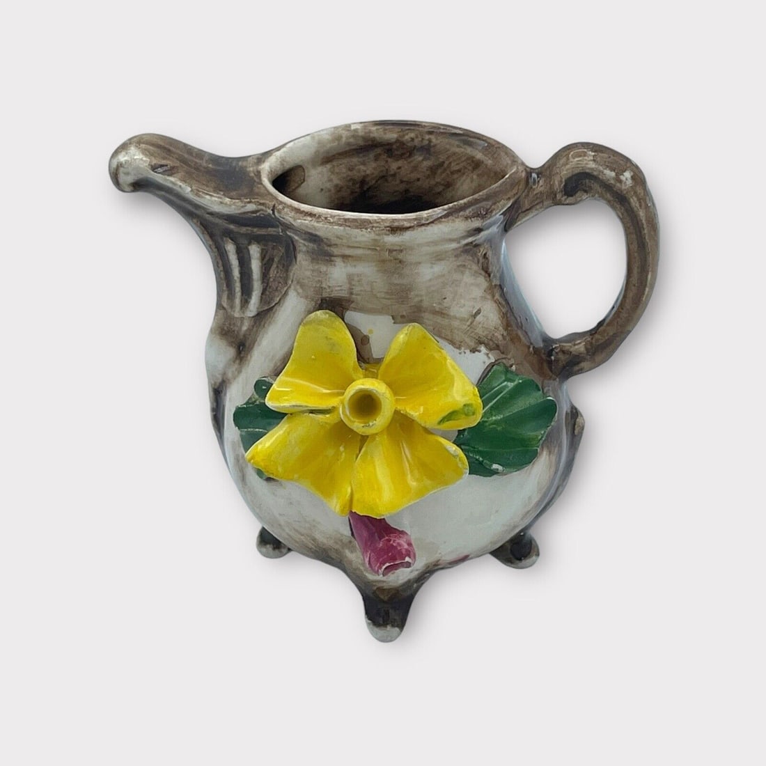 Vintage Capodimonte Decorative Creamer Ceramic Italy: Title: Vintage Capodimonte Decorative Creamer Ceramic Italy Description: Vintage Capodimonte Decorative Creamer Ceramic Italy . Condition is Used. Shipped with USPS Ground Advantage. Reserve: $30.00 S