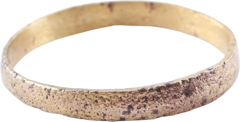 VIKING WEDDING RING 866-1067 AD: Gilt bronze, size 8 3/4. 2.2-2.8mm width with low rounded face. Surface textured from burial. Professionally refurbished with the surface restored in 24karat gold. See the reference image which shows