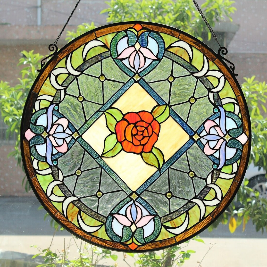23" Round Stained Glass Window Hanging Panel Suncatcher: Description 23.6" Wide 35.83" max hanging height with chain Wonderful reproduction stained glass window panel meticulously handcrafted from pieces of hand cut stained art glass. Each individual piece