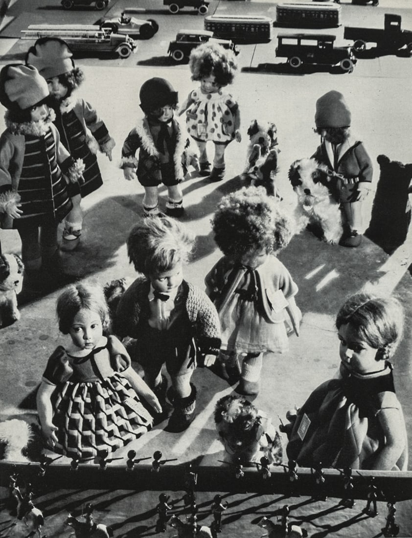 MARGARET BOURKE-WHITE - Dolls in a Store Window 1929: Artist: Margaret Bourke-White Title: Dolls in a Store Window, 1929 Medium: Photo Litho, 1972, USA Dimensions: 5.1x6.7" Description: Heat Wax Mounted on 8.5x11" Conservation Board Artist Bio: Margaret 