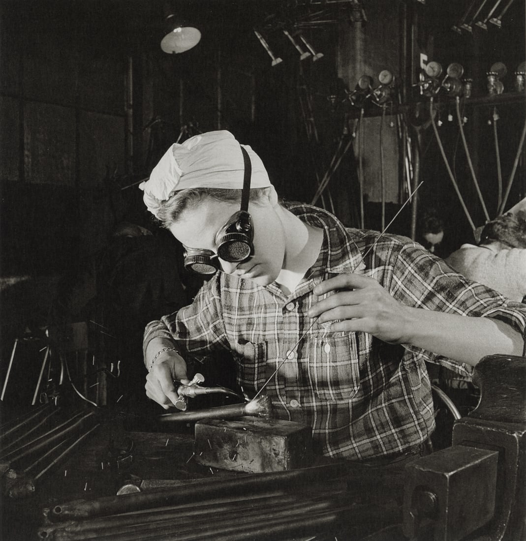 SAM SHAW - Woman At Work During World War II, 1944: Artist: Sam Shaw Title: Woman At Work During World War II At The Bazooka Factory, 1944 Medium: Photo Litho, 2010, Germany Dimensions: 7.5x7.75" Description: Heat Wax Mounted on 11x14" Conservation Boa