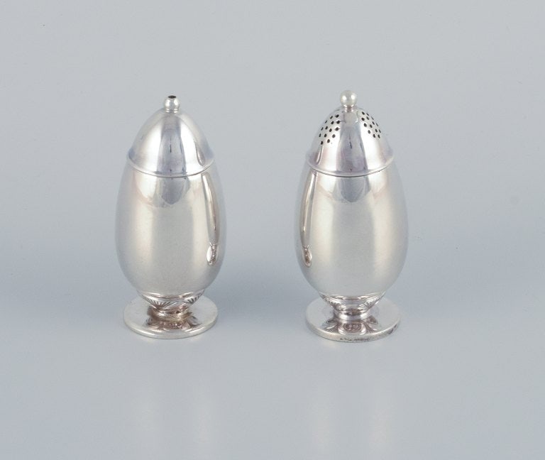 Gundorph Albertus (1887-1970) for Georg Jensen, Denmark, "Cactus" salt and pepper shakers in: Gundorph Albertus (1887-1970) for Georg Jensen, Denmark, "Cactus" salt and pepper shakers in sterling silver. Designed in 1930. Model number: 629A. Stamped with 1945-51 Georg Jensen & Wendel hallmarks