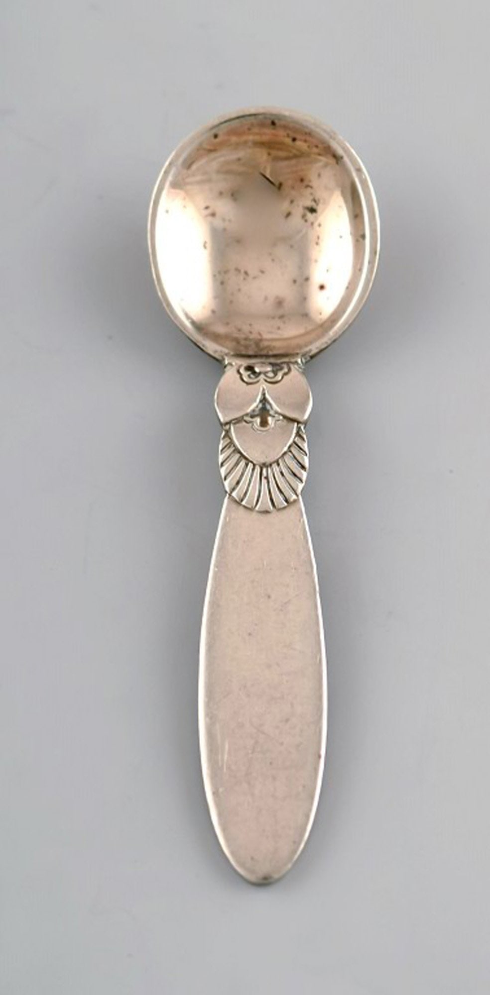 Georg Jensen Sterling Silver 'Cactus' cutlery. Salt spoon.: Georg Jensen Sterling Silver 'Cactus' cutlery. Salt spoon. 2 pcs. in stock. Measures 5.5 cm. In good condition. Stamped. Designed by Gundorph Albertus in 1930. Reserve: $49.00 Shipping: Domestic: Ship
